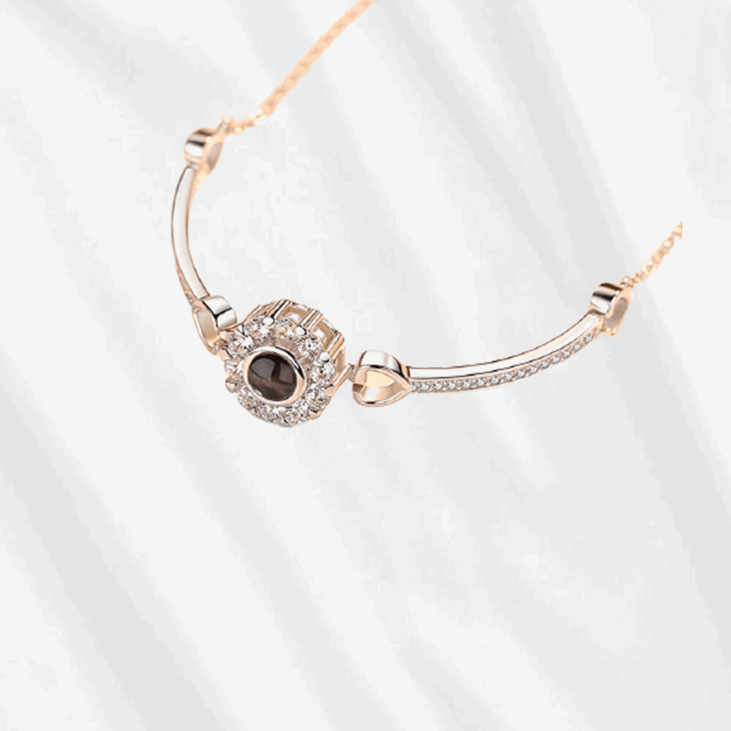 Customodish's photo projection bracelet is made from 925 sterling silver, and plated in 14k gold. Customize now!