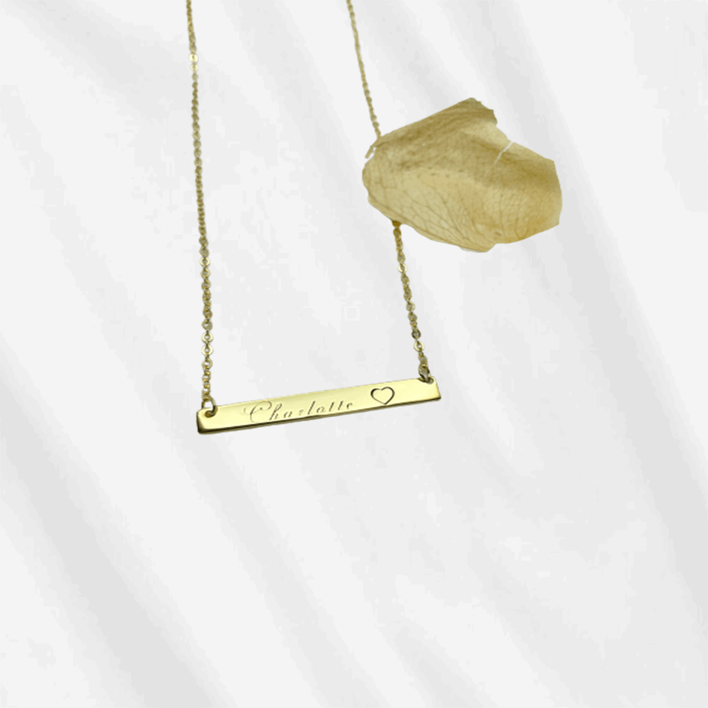The personalized bar necklace is just classic and elegant. You can personalize it with your name or your loved one's name.