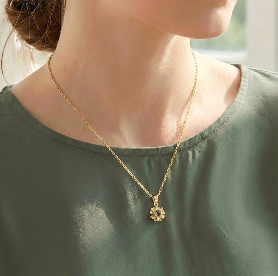 woman wearing personalized daisy projection necklace 