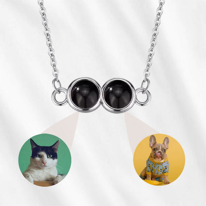 double projection necklace with two hidden pictures inside