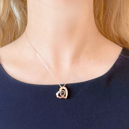 woman wearing a Photo Heart Projection Pendant