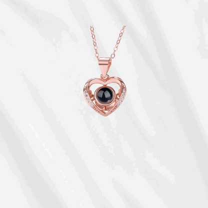 heart projection necklace with picture inside
