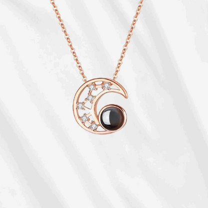 Customodish's Moon Projection Necklace is crafted in sterling silver and plated in 14k gold. 
