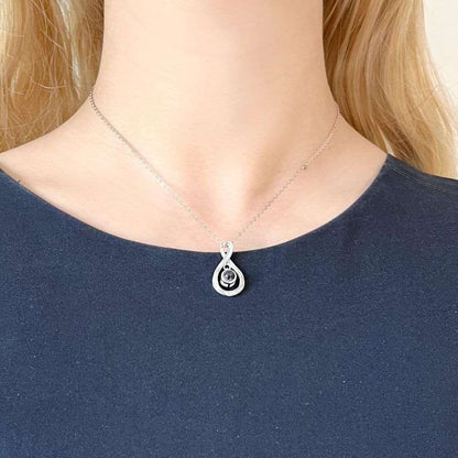 woman wearing a Water Drop Necklace You Can See a Picture Through