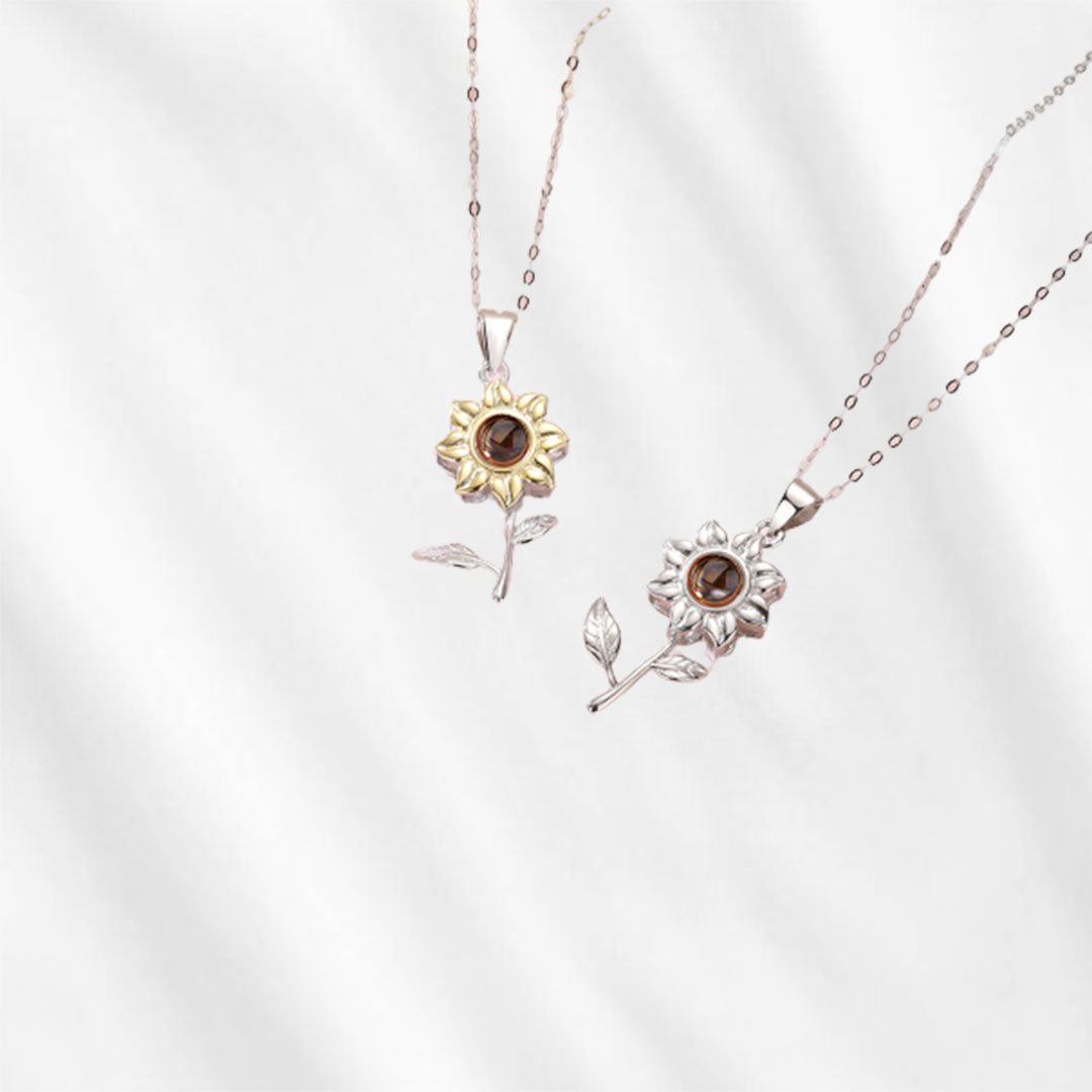 This necklace with picture inside is available in two colors.