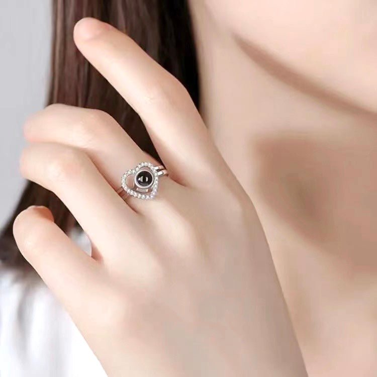 A photo projection ring, also called a projector ring, is a unique ring that stores your favorite picture inside its central stone. You can take your favorite memories with you wherever you go!