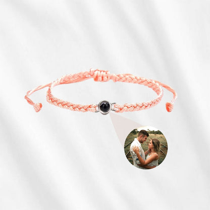 Personalized circle photo bracelet with picture inside in pink.