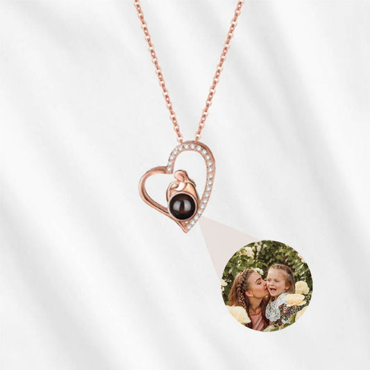 Mother projection necklace in rose gold.