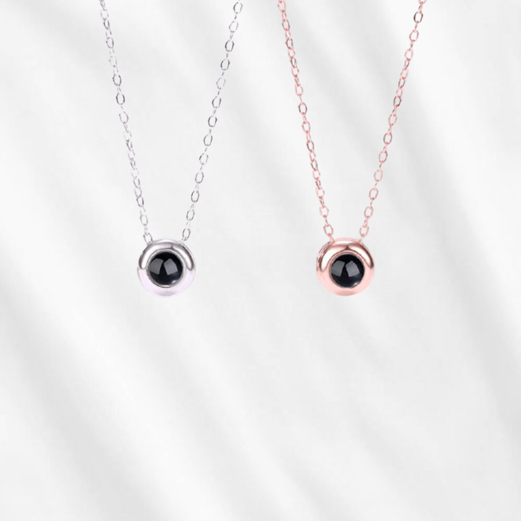 A minimalist's favorite pick, our circle projection necklace is simple and classic. It puts your picture inside, and through light can project the photo onto a wall.
