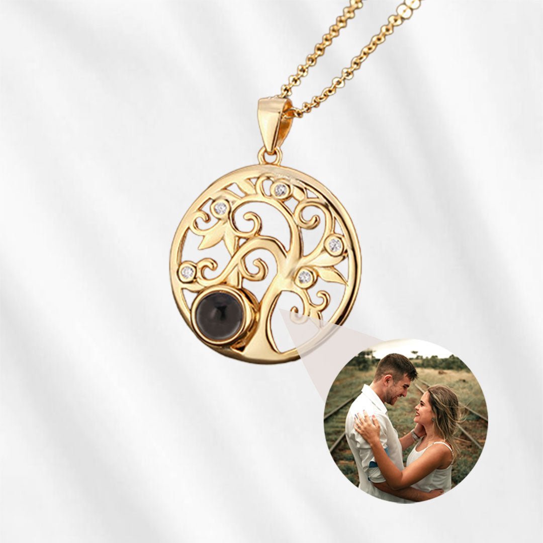 necklace with picture inside tree gold
