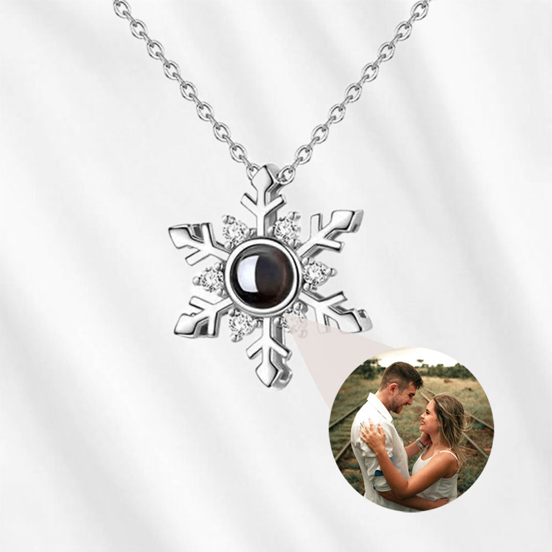 Snowflake projection necklace.