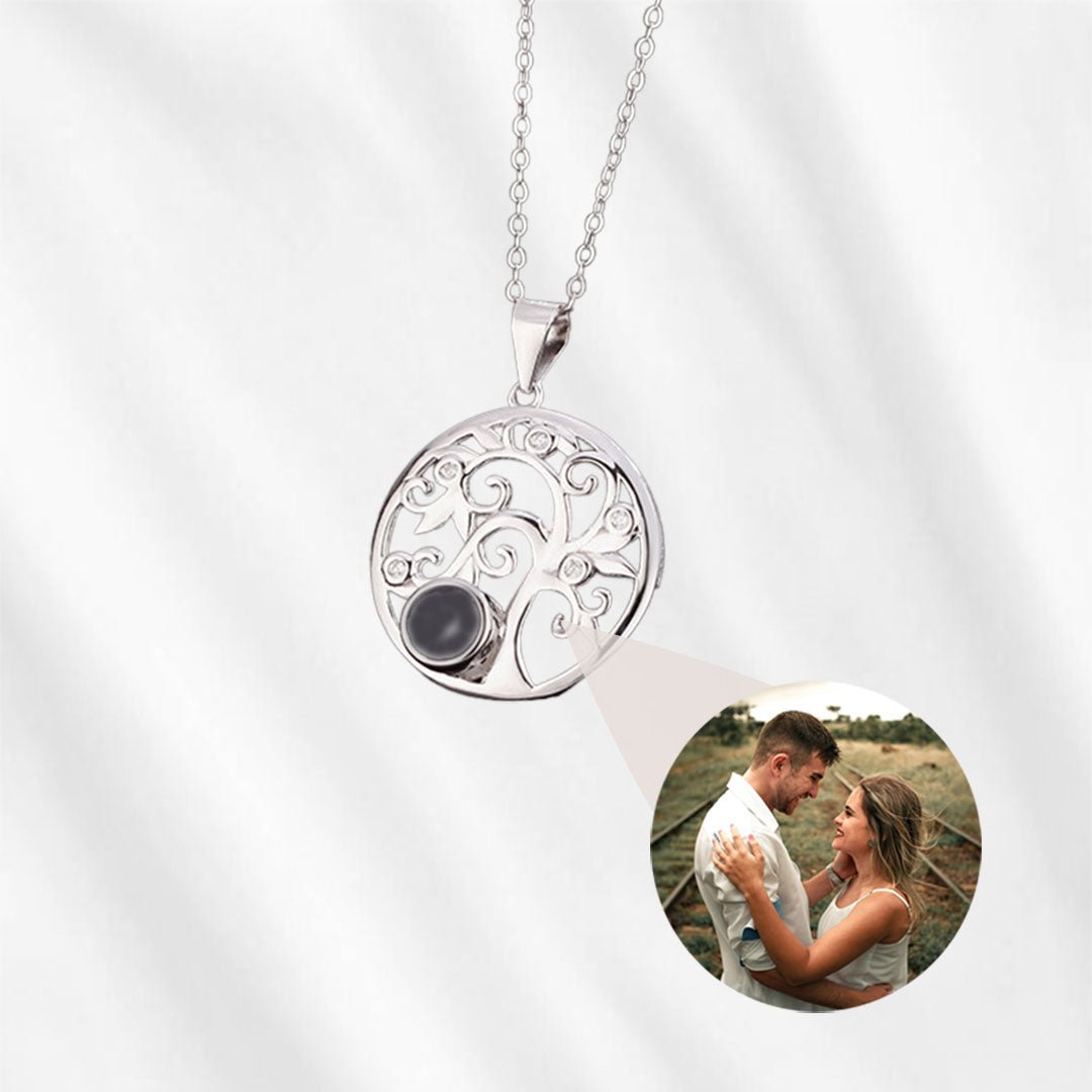 necklace with picture inside tree