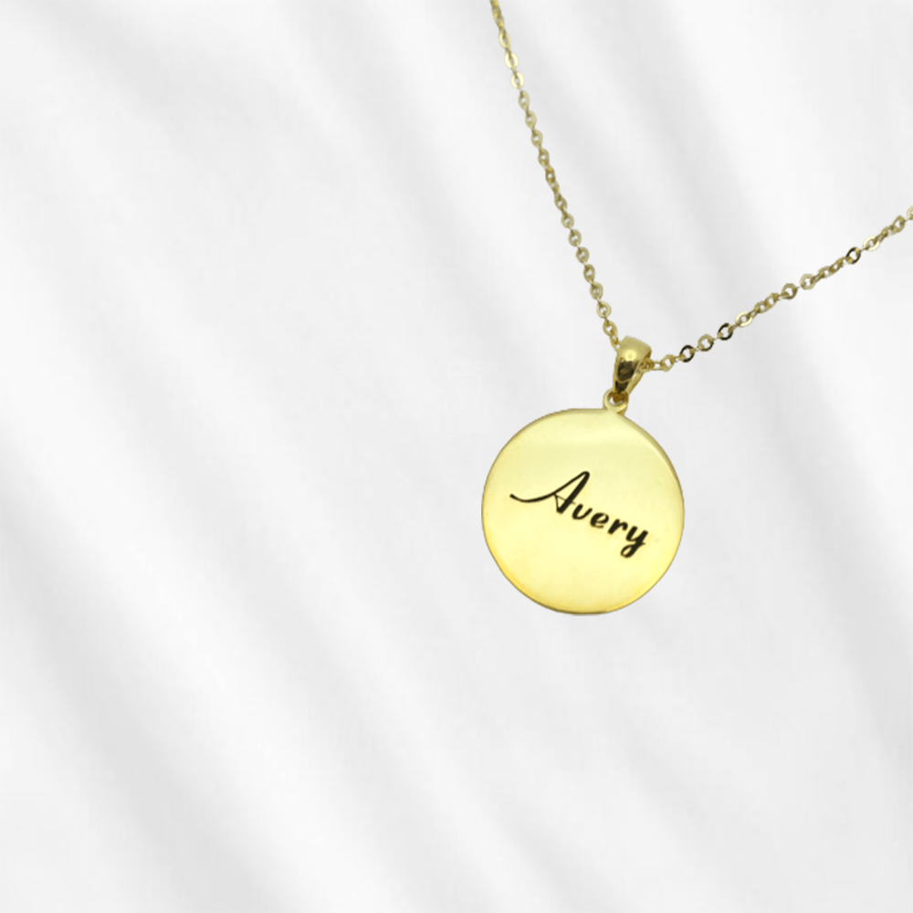 This personalized name necklace round disc looks very classic and dainty. Start customizing and make a necklace for yourself!