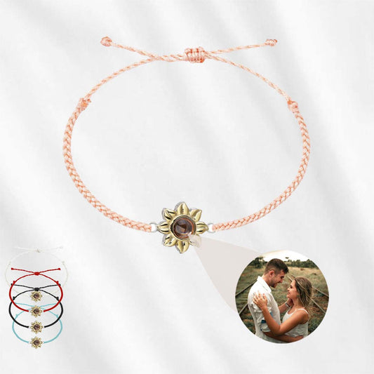 This photo projection bracelet features a sunflower charm with a center stone that carries your cherished photo inside!